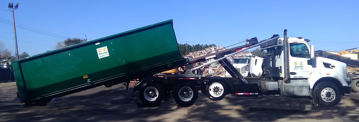 30 yard dumpster loading on truck